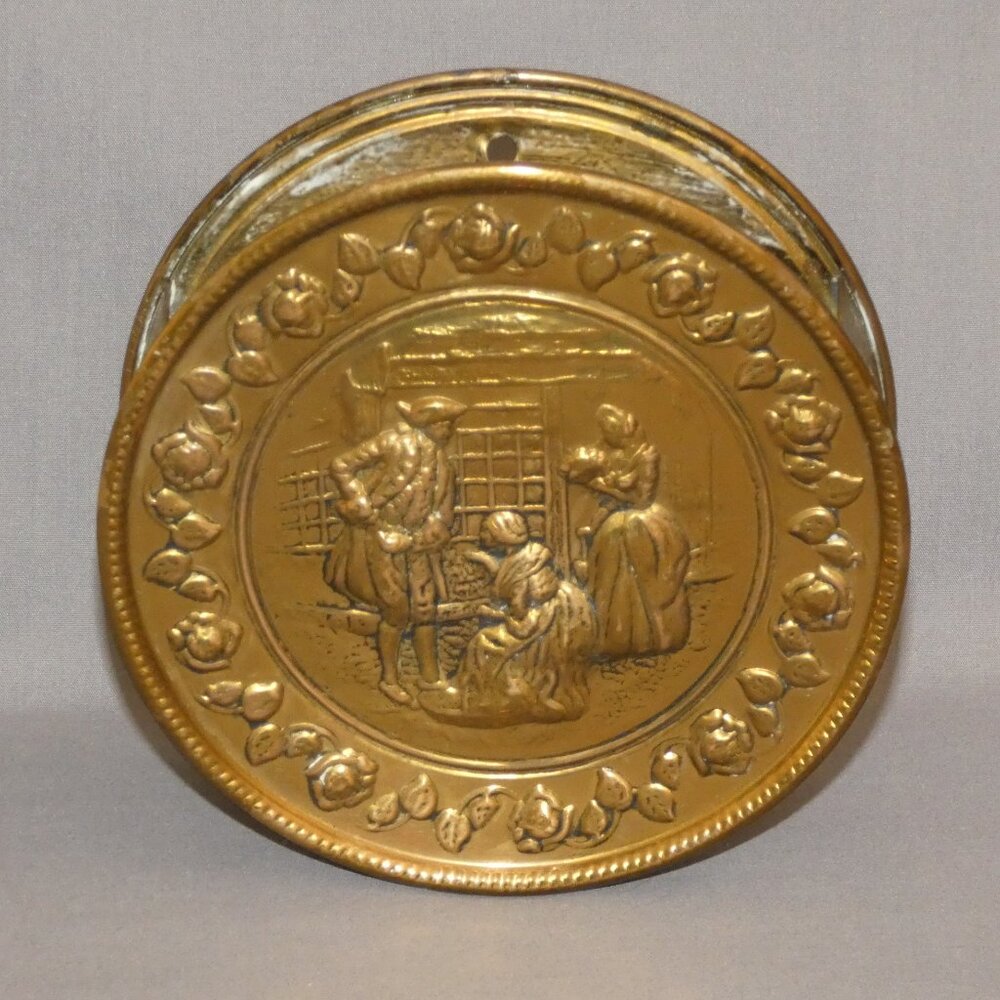 Vintage embossed brass wall pocket